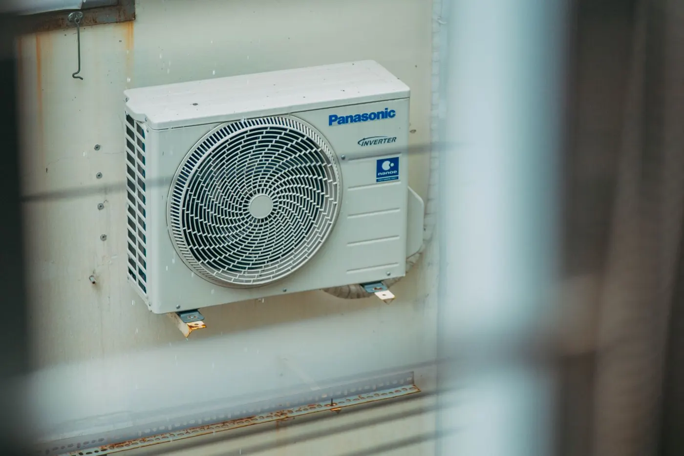 Outdoor AC condenser — capacitor, contactor and fan motor repairs